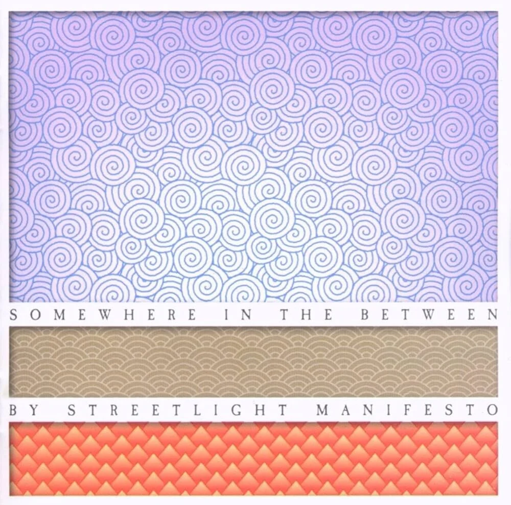 Pre-Order: Streetlight Manifesto - Somewhere In The Between [Indie Exclusive] [Colored Vinyl] [Indie Exclusive] [Reissue]